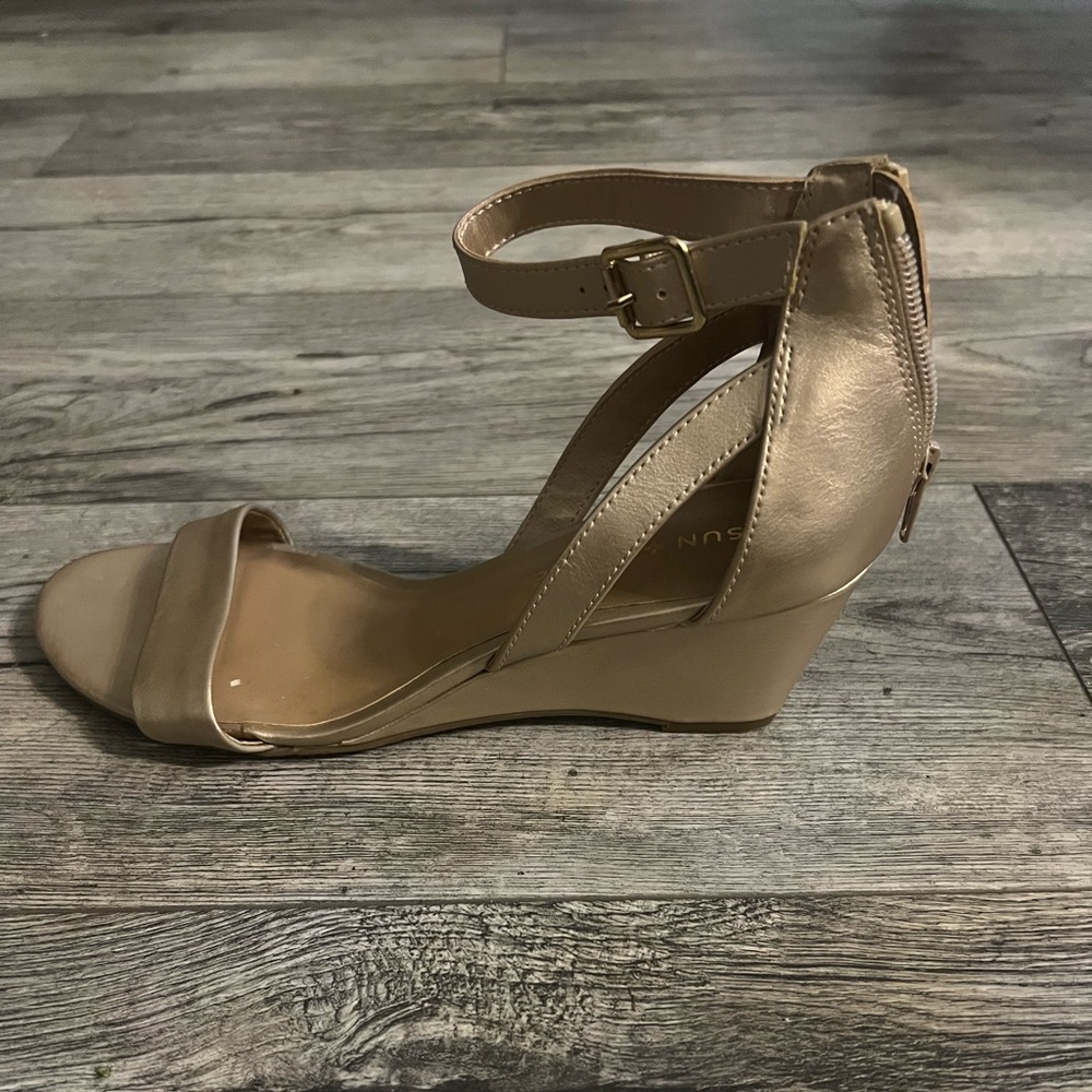 Gold sandals with a small wedge heel, by Sun and Stone, size 8.5